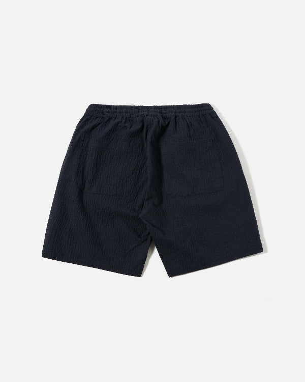 UNIVERSAL WORKS SIMPLE SHORT IN DARK NAVY OSPINA COTTON