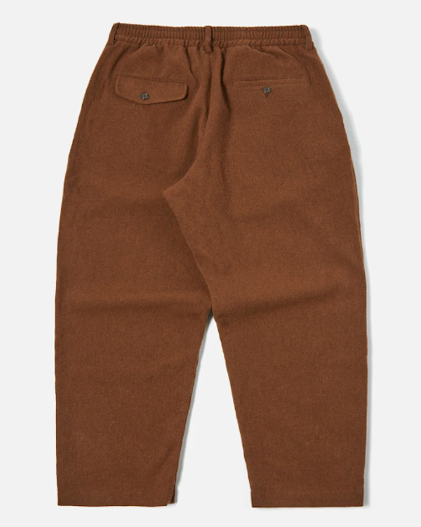 UNIVERSAL WORKS TRACK PANT IN CUMIN RECYCLED SOFT WOOL