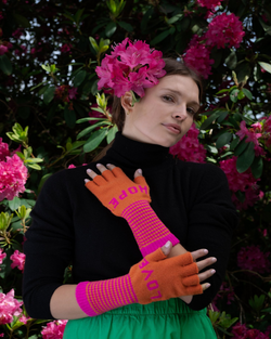 QUINTON CHADWICK FINGERLESS LOVE HOPE GLOVES IN ORANGE AND FUCHSIA PINK