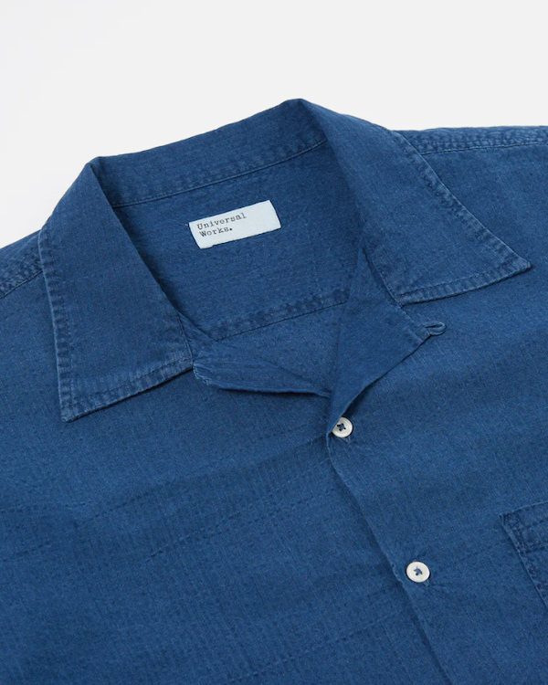 UNIVERSAL WORKS LONG SLEEVE CAMP SHIRT II IN WASHED INDIGO SEERSUCKER