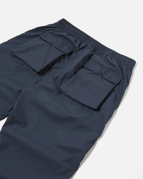 UNIVERSAL WORKS OXFORD PARACHUTE PANT IN NAVY RECYCLED POLY TECH