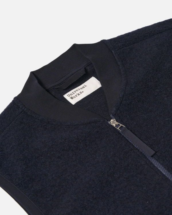 UNIVERSAL WORKS ZIP WAISTCOAT IN NAVY WOOL FLEECE