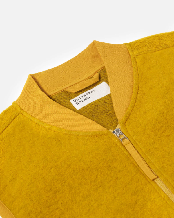 UNIVERSAL WORKS ZIP WAISTCOAT IN YELLOW WOOL FLEECE