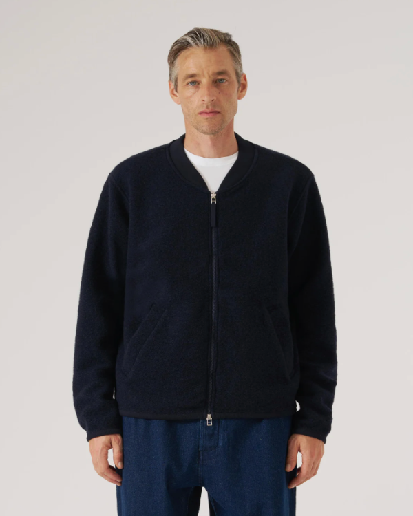 UNIVERSAL WORKS ZIP BOMBER IN NAVY WOOL FLEECE
