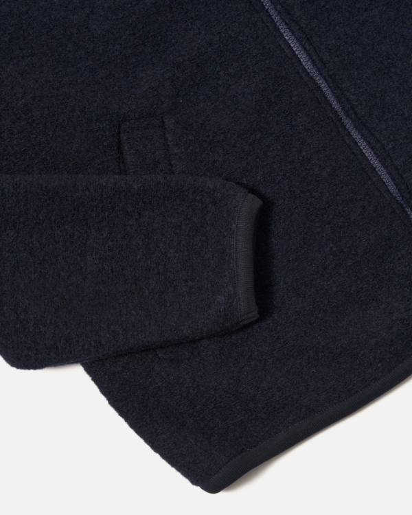 UNIVERSAL WORKS ZIP BOMBER IN NAVY WOOL FLEECE