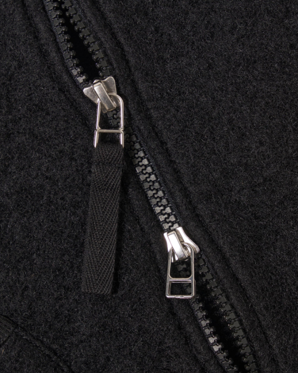 UNIVERSAL WORKS ZIP WAISTCOAT IN BLACK WOOL FLEECE
