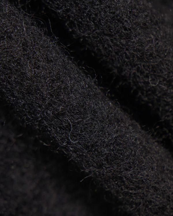 UNIVERSAL WORKS ZIP WAISTCOAT IN BLACK WOOL FLEECE