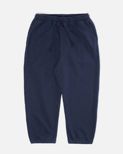 UNIVERSAL WORKS TRACK PANT IN NAVY DRY HANDLE LOOPBACK