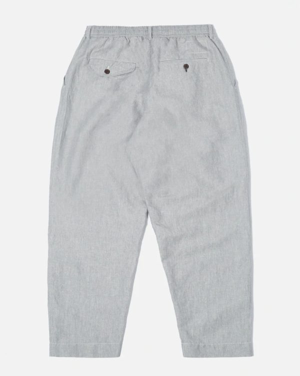 UNIVERSAL WORKS PLEATED TRACK PANT IN GREY MASTERPIECE LINEN COTTON